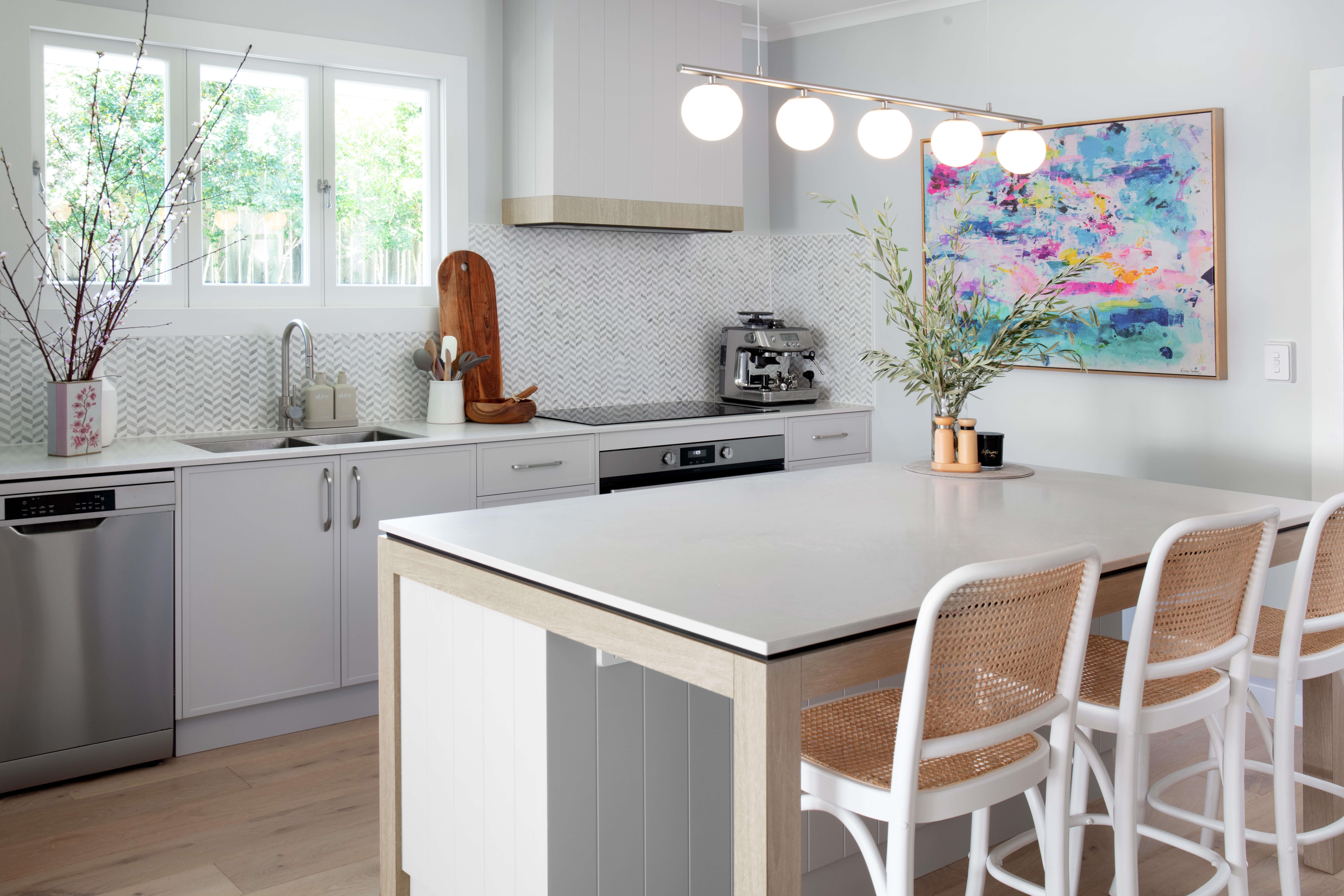 The dynamic pattern of the Chevron Marble Mosaic tiles adds movement and magic to this magnificent kitchen designed by Brisbane's Marilena Baynes (Marilena Baynes Interior Design Studio). 